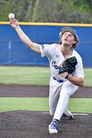 Capital City pitcher Brock Miles delivers the ball to the plate during Monday night's game against Blair Oaks at Capital City High School. (Shaun Zimmerman/News Tribune)